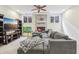 Basement living room featuring a brick fireplace and large sectional sofa at 5325 Tracey Jo Rd, Greenwood, IN 46142
