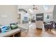 Bright living room with vaulted ceilings, skylights, a fireplace, and hardwood flooring at 5325 Tracey Jo Rd, Greenwood, IN 46142