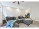 A cozy living room featuring a sectional sofa and view of the nearby study at 5325 Tracey Jo Rd, Greenwood, IN 46142