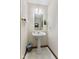 Bright half-bathroom featuring a pedestal sink, and decorative wall art at 5341 W Stonehaven Ln, New Palestine, IN 46163