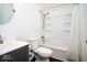 Bathroom with toilet, shower with curtain, and vanity with sink at 5424 Milhouse Rd, Indianapolis, IN 46221