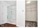 This bathroom has an enclosed tub/shower and walk in closet at 5424 Milhouse Rd, Indianapolis, IN 46221