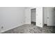 This cozy bedroom features neutral walls and modern carpet at 5424 Milhouse Rd, Indianapolis, IN 46221