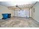 Spacious garage featuring an insulated door, perfect for storage and vehicle parking at 5424 Milhouse Rd, Indianapolis, IN 46221