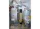 Mechanical room featuring a newer model furnace and water heater at 5424 Milhouse Rd, Indianapolis, IN 46221