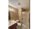 Bathroom with a vanity sink, toilet, and glass enclosed shower at 5441 Red Hawk Ln, Greenwood, IN 46142