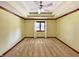 Bedroom with a trey ceiling, ceiling fan, neutral carpet, and natural light at 5441 Red Hawk Ln, Greenwood, IN 46142