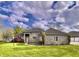 Attractive brick home with a well-manicured lawn and lovely landscaping at 5441 Red Hawk Ln, Greenwood, IN 46142