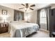 Charming bedroom with a ceiling fan and soft, natural light at 5442 Hibben Ave, Indianapolis, IN 46219
