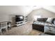 Carpeted bonus room with a cozy entertainment and relaxation area at 5442 Hibben Ave, Indianapolis, IN 46219