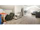Carpeted bonus room with a sink, entertainment area, and plenty of space at 5442 Hibben Ave, Indianapolis, IN 46219