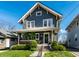 Attractive home with a covered front porch, perfect for enjoying the outdoors at 5442 Hibben Ave, Indianapolis, IN 46219