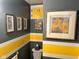Bathroom with unique wall art and striped walls at 5626 Hammon Dr, Brownsburg, IN 46112