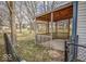 Back yard wooden patio with a fence to a large private yard, great for entertaining and relaxing at 5752 Echo Way, Indianapolis, IN 46278