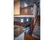Staircase featuring carpeted steps and wooden railings at 5752 Echo Way, Indianapolis, IN 46278