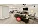 Spacious basement offers comfortable seating, a bar area, and entertainment options at 5802 Bentbrook Dr, Bargersville, IN 46106