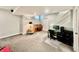 Spacious basement area featuring a piano, desk setup, and ample open floor space at 5802 Bentbrook Dr, Bargersville, IN 46106