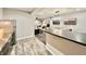 This finished basement includes a bar, game area, and lounge space, perfect for entertaining guests at 5802 Bentbrook Dr, Bargersville, IN 46106