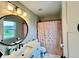 Modern bathroom featuring vanity with decorative mirror and modern lighting fixtures at 5802 Bentbrook Dr, Bargersville, IN 46106
