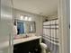 Bathroom featuring vanity with black hardware and decorative mirror at 5802 Bentbrook Dr, Bargersville, IN 46106
