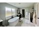 Spa-like bathroom with a free-standing tub and a walk-in shower at 5802 Bentbrook Dr, Bargersville, IN 46106