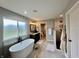 Spacious bathroom featuring a freestanding tub, vanity, and walk-in shower at 5802 Bentbrook Dr, Bargersville, IN 46106