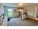 Well lit bedroom features a bunk bed with shelves and a bright window view at 5802 Bentbrook Dr, Bargersville, IN 46106