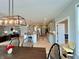 Open dining and kitchen area with modern lighting and an easy flow into the living room at 5802 Bentbrook Dr, Bargersville, IN 46106