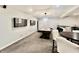 Open game room featuring a bar area, air hockey table, and modern decor at 5802 Bentbrook Dr, Bargersville, IN 46106