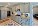 Modern kitchen features stainless appliances, granite countertops, and ample cabinet space at 5802 Bentbrook Dr, Bargersville, IN 46106