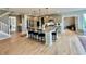 Spacious kitchen island with seating, stainless steel appliances, and access to the living area at 5802 Bentbrook Dr, Bargersville, IN 46106