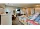 Cozy main bedroom with a seating area and a view to the tv room at 5802 Bentbrook Dr, Bargersville, IN 46106