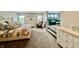 Spacious main bedroom with sitting area, lots of natural light, and neutral decor at 5802 Bentbrook Dr, Bargersville, IN 46106