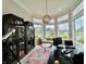 Stylish home office featuring a bay window, built-in shelves, and contemporary decor at 5802 Bentbrook Dr, Bargersville, IN 46106