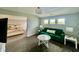 Bright TV room featuring a sofa and multiple windows at 5802 Bentbrook Dr, Bargersville, IN 46106