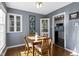 Cozy dining area featuring hardwood floors, natural light, and stylish decor at 6164 Evanston Ave, Indianapolis, IN 46220