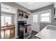 A kitchen view that shows the cooking range, sink area, and door to the dining room at 6164 Evanston Ave, Indianapolis, IN 46220
