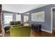 Inviting living room featuring hardwood floors, natural light, and neutral decor at 6164 Evanston Ave, Indianapolis, IN 46220