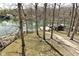 A view of the backyard leading to the lake and private dock at 7014 Eagle Dr, Nineveh, IN 46164