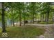 View of lake from yard with a pathway leading to the water at 7014 Eagle Dr, Nineveh, IN 46164
