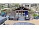 The outdoor bar from a high angle, showcasing the grill, seating area, and surrounding neighborhood at 7014 Eagle Dr, Nineveh, IN 46164
