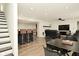 Finished basement with a bar area, a fireplace, vinyl floors, and comfortable seating at 7014 Eagle Dr, Nineveh, IN 46164