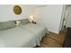 Inviting bedroom with two twin beds, neutral decor, and a closet for storage at 7014 Eagle Dr, Nineveh, IN 46164