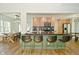 Stylish open-concept kitchen with an island, wood cabinets, and modern appliances at 7014 Eagle Dr, Nineveh, IN 46164