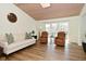 Comfortable living room featuring a couch and chairs with natural light from large windows at 7014 Eagle Dr, Nineveh, IN 46164