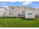View of a well-maintained backyard with a cozy wood deck at 7128 English Oak Dr, McCordsville, IN 46055