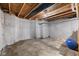 Unfinished basement features concrete walls, exposed wood beams, and concrete flooring at 7128 English Oak Dr, McCordsville, IN 46055