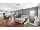 Open-concept design seamlessly blends the living and dining areas in this stylishly appointed home at 7128 English Oak Dr, McCordsville, IN 46055