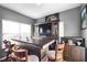 Basement bar area with wood bar, seating, and custom shelving at 7128 English Oak Dr, McCordsville, IN 46055