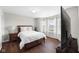 Spacious main bedroom features a bay window and wood floors at 7128 English Oak Dr, McCordsville, IN 46055